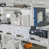 Automated CNC Lathe with Gantry Loading System Integrates machining with automated material handling